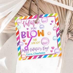 May include: A colorful Valentine's Day card with a bubble wand and the text "Valentine, you blow me away! Happy Valentine's Day! Love, Charlotte."