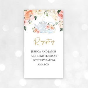 Puede incluir: Una tarjeta blanca con un diseño floral que presenta una tetera y una taza de té. El texto dice "Registry" en letras doradas. Debajo del texto, dice "Jessica and James are registered at Pottery Barn & Amazon".