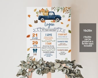 May include: A blue truck with pumpkins and fall leaves on the back. The truck is on a white background with a blue and orange border. The text "Logan" is at the top of the poster. The poster also includes information about Logan's first birthday, including his weight, height, favorite foods, and songs. The poster is 16x20 inches and can be printed as an 8x10 inch sign.
