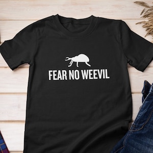 May include: Black t-shirt with a white graphic of a weevil and the text "FEAR NO WEEVIL".