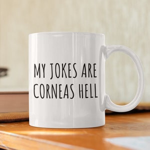 Funny Optometrist Mug - Ophthalmologist Gift - Optician Present - My Jokes Are Corneas Hell