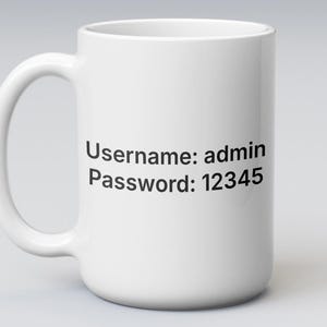 Peut inclure: Une tasse en céramique blanche avec une anse incurvée. La tasse porte le texte noir "Username: admin Password: 12345". La tasse est de taille et de forme standard.