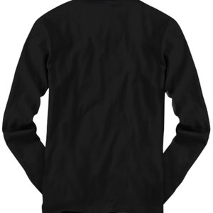 May include: A solid black long-sleeve shirt. The shirt has a crew neck and a classic, simple design. The sleeves are long and extend to the wrists. The fabric appears to be a soft, comfortable material.