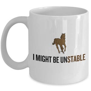 May include: White ceramic coffee mug with a brown horse illustration and the text "I might be unstable".