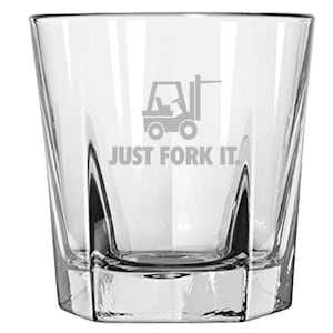 May include: A clear glass rocks glass with a white outline of a forklift and the text "JUST FORK IT."