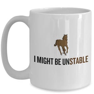 May include: White ceramic mug with a brown cartoon horse running and the text "I might be unstable" in black.