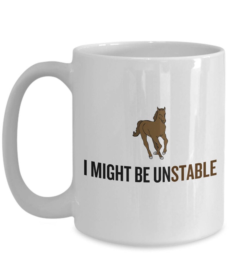 May include: White ceramic mug with a brown cartoon horse running and the text "I might be unstable" in black.