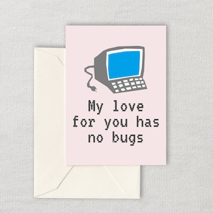 May include: A pink card with a grey computer illustration and the text "My love for you has no bugs".