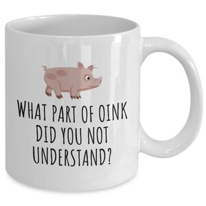 May include: White ceramic coffee mug with a cartoon pig and the text "What part of oink did you not understand?"