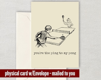 Op de afbeelding: Een humoristische kaart met een zwart-witte illustratie van twee mensen die tafeltennis spelen. De tekst op de kaart luidt "you're the ping to my pong".