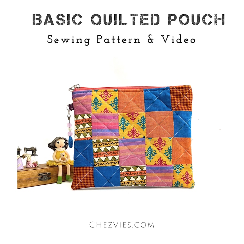 K&ouml;nnte beinhalten: Eine farbenfrohe gesteppte Tasche mit Rei&szlig;verschluss. Die Tasche besteht aus Patchwork-Stoff mit verschiedenen Mustern und Farben, darunter Blau, Gelb, Orange, Rosa und Gr&uuml;n. Die Tasche ist eine gro&szlig;artige M&ouml;glichkeit, kleine Gegenst&auml;nde zu verstauen und Ihren Besitzt&uuml;mern eine pers&ouml;nliche Note zu verleihen.