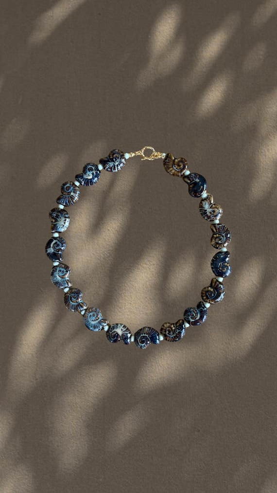 Off Duty | Brown & Blue Ceramic Snail Shell Bead Shell Necklace | Coastal Statement Jewelry | The Local Edit