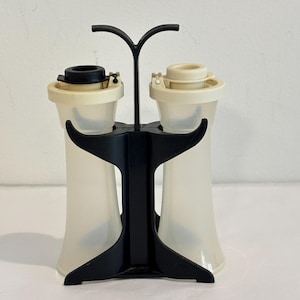 Vintage Tupperware salt & pepper shakers in caddy hourglass shaped small size