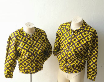 Summer Vibes Bomber Jacket in African style yellow and purple cotton fabric. Elasticated waist with pockets and strong metal zip.