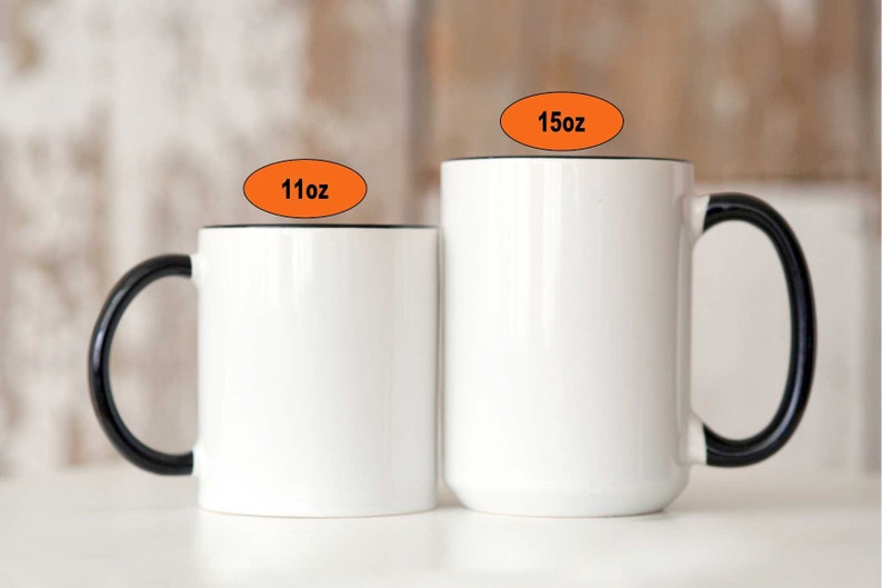 May include: Two white ceramic mugs with black handles. The mug on the left is 11 oz and the mug on the right is 15 oz.