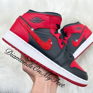 Swarovski Women&#39;s Air Jordan 1 Mid Banned Black Red Bred Sneakers Blinged Out With Authentic Red Swarovski Crystals Custom Bling MJ Shoes