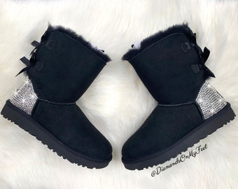 Swarovski Women s UGG Bailey Bow 2 Mid Black Boots Blinged Out With Authentic Clear Swarovski Crystals Custom Bling UGG Winter Boots Shoes Etsy