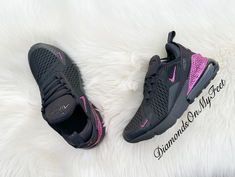 May include: Black Nike Air Max 270 sneakers with pink rhinestones on the swoosh and heel. The text "Diamonds On My Feet" is visible on the right shoe.