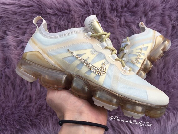 clear and gold nikes