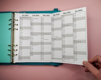 Calendario imprimible desplegable "Resumen del año 2026", planificador anual. Añade días festivos o eventos personales. Imprime en tamaño A4 o Carta para que quepa en un planificador A5.