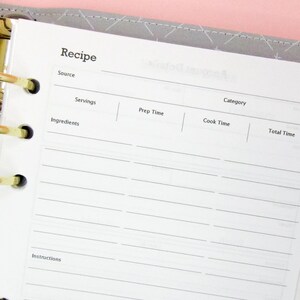 May include: A white recipe page with lines for writing down ingredients, instructions, prep time, cook time, and total time. The page is labeled "Recipe" at the top and has spaces for the source, servings, and category.