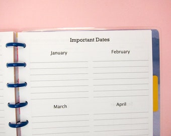 May include: A white planner with a blue binder and a yellow tab. The planner has a section for important dates with the months January, February, March, and April listed.