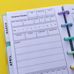 May include: A white planner with a symptom tracker for March and April. The tracker includes sections for pain, self-care, GP visit, hospital visit, and specialist visit. The planner also has a section for therapy appointments with space for therapist name, appointment goals, and questions.