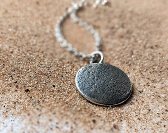 sand impressed silver disc necklace pendant