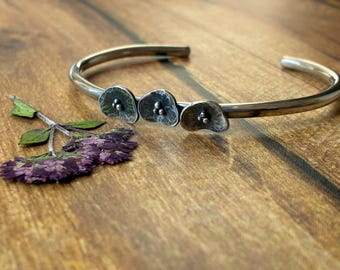 silver poppy flower torque bangle bracelet