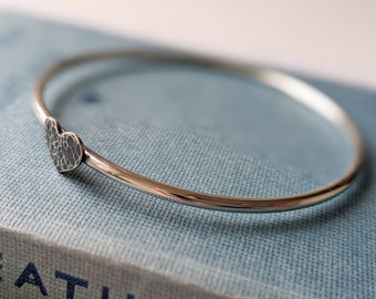 silver bangle with hammered silver heart