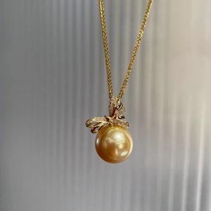 18K gold solid spiga chain, Au750 gold, natural south sea Philippines golden pearl,18K gold solid pendant with bow knot zircon