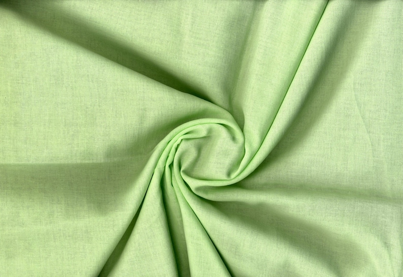 Lightweight cotton voile with a soft, semi-sheer weave ideal for delicate and airy designs CELERY