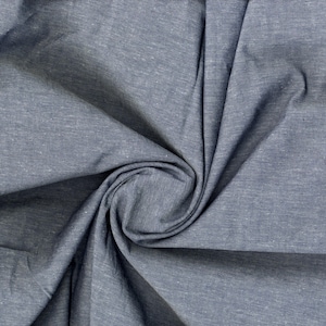 Fine woven surface with delicate heather effect, combining traditional chambray charm with flexible comfort INDIGO/WHITE