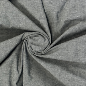 Fine woven surface with delicate heather effect, combining traditional chambray charm with flexible comfort