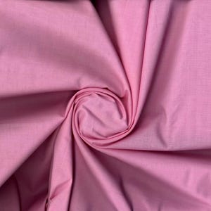 Lightweight cotton lawn with smooth weave, semi-sheer drape, perfect for dresses, quilts, and blouses