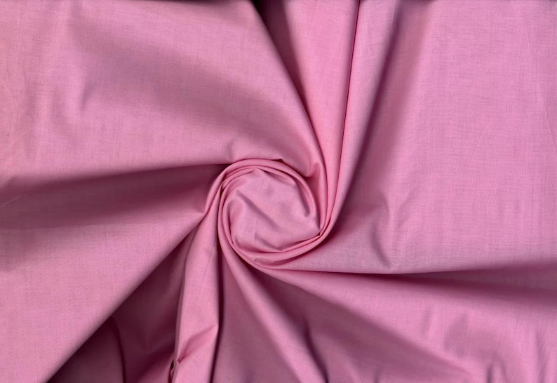 Lightweight cotton lawn with smooth weave, semi-sheer drape, perfect for dresses, quilts, and blouses