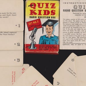May include: Vintage Quiz Kids Radio Question Bee game set. The image shows a box with the game title and a cartoon illustration, along with instruction sheets and question cards. The cards have questions and answers.