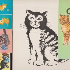 May include: A selection of vintage cat illustrations. Features a black and white cat drawing, a tabby cat on a green background, and small cards with kitten illustrations in different poses and colours.