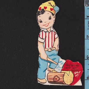 May include: Vintage Valentine's Day card featuring a cartoon lumberjack. He wears a yellow hat with red hearts, a red and white striped shirt, and blue pants. He holds an axe over a log with a heart-shaped message that reads "Valentine I hope we never split up!"