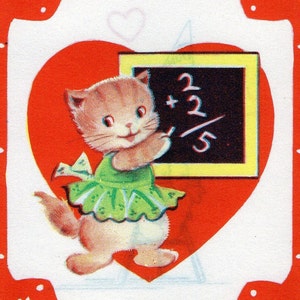 May include: A red heart with a white outline and white polka dots. Inside the heart is a brown and white kitten wearing a green dress and holding a black chalkboard with the equation 2 + 2 / 5 written in white.
