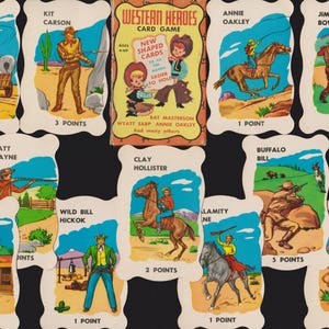 May include: A collection of vintage Western Heroes card game cards. Each card features a different character illustration with point values. The game box is visible, with the title "Western Heroes" and the text "New Shaped Cards".