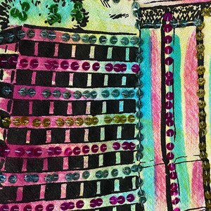 May include: A close-up of a fabric with a colorful design of a building with a black and white grid pattern. The fabric is decorated with sequins in various colors, including pink, green, and gold.