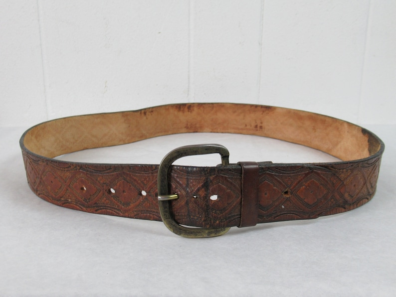 hand tooled belt brown leather belt hand tooled Vintage belt hippy belt vintage clothing 34 to 39 brass buckle 1960s belt