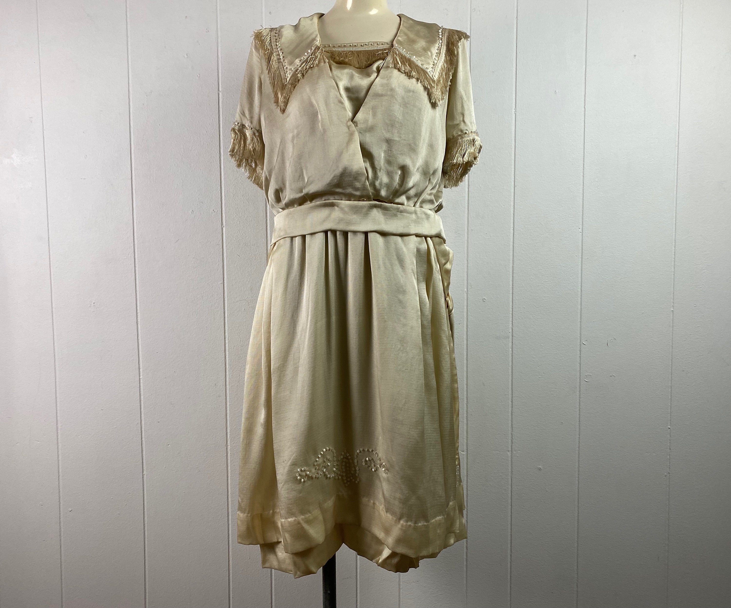 Real Vintage Search Engine Vintage Dress, 1910S Dress 1920S Flapper Art Deco Beaded Vintage Clothing, White Silk, Size Medium $249.00 AT vintagedancer.com