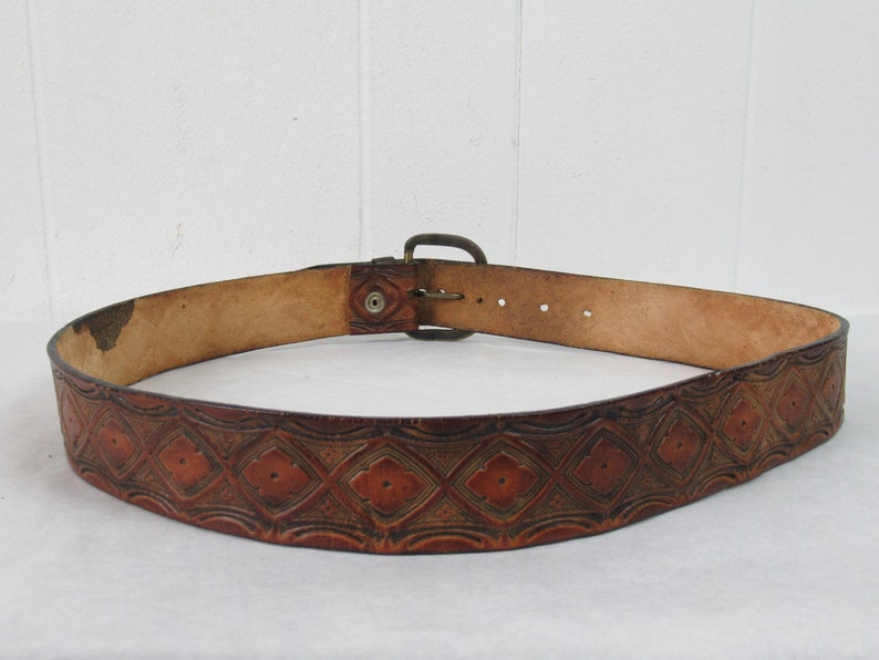 hand tooled belt brown leather belt hand tooled Vintage belt hippy belt vintage clothing 34 to 39 brass buckle 1960s belt