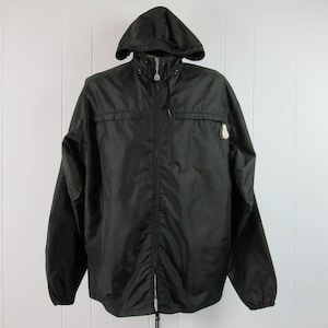 Jaqueta vintage, jaqueta dos anos 50, jaqueta de esqui, parka vintage, blusão vintage, jaqueta com capuz, jaqueta de perfil, roupas vintage, tamanho grande