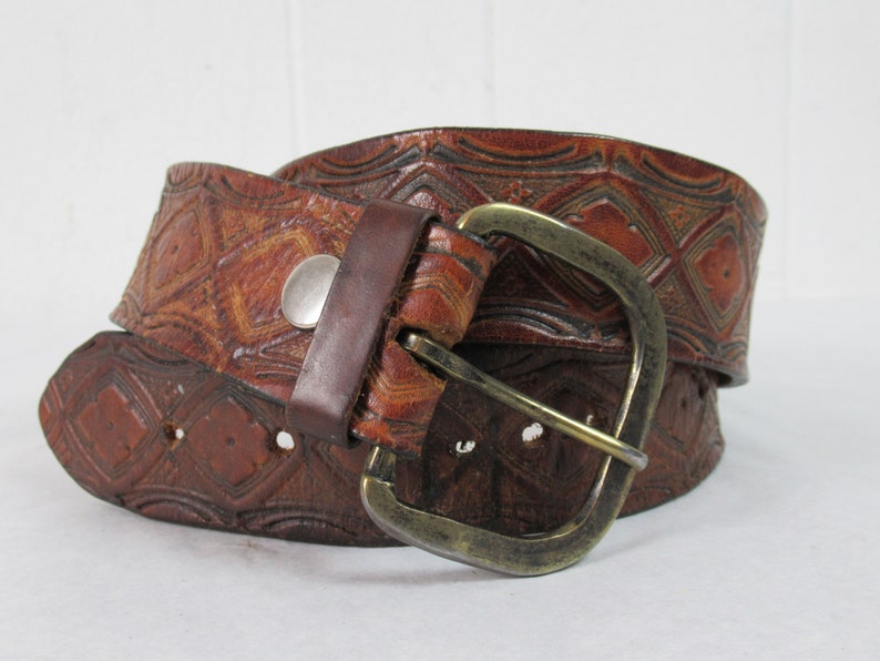 hand tooled belt brown leather belt hand tooled Vintage belt hippy belt vintage clothing 34 to 39 brass buckle 1960s belt