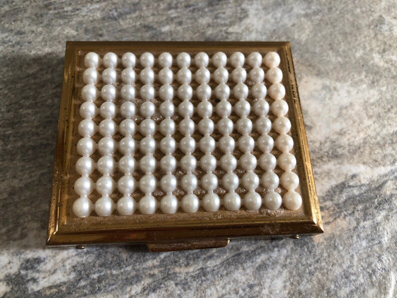 Vintage compact with faux pearls
