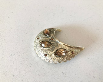 Vintage crescent brooch with citrine coloured stones