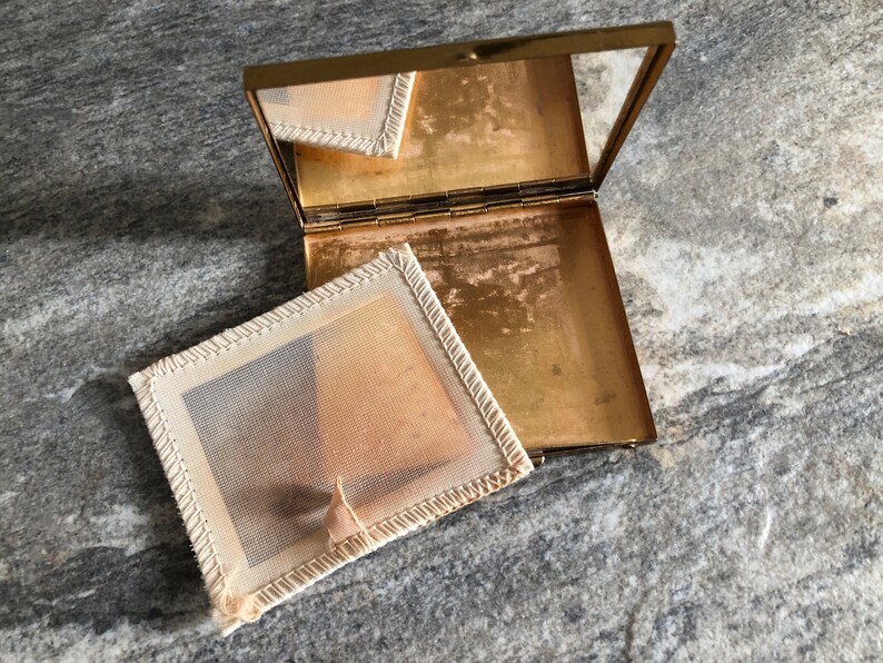 Vintage compact with faux pearls